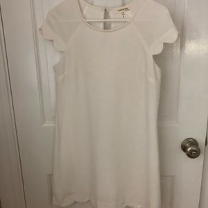 White scalloped mini dress